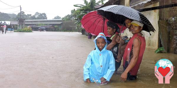 famiglia alluvionata in Madagascar